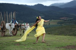 Women running in farm field